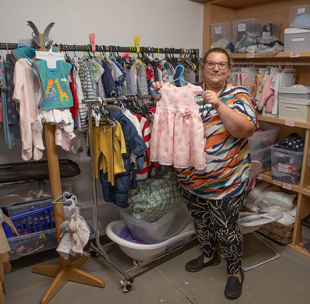Eloise a Baby Basics volunteer in our store room